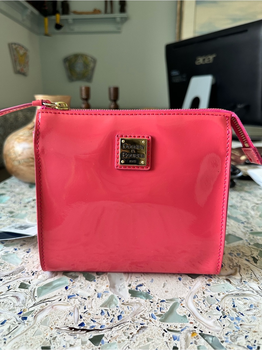 Dooney & Bourke North-South Janine Patent Crossbody Pouch in Bubble Gum Pink
